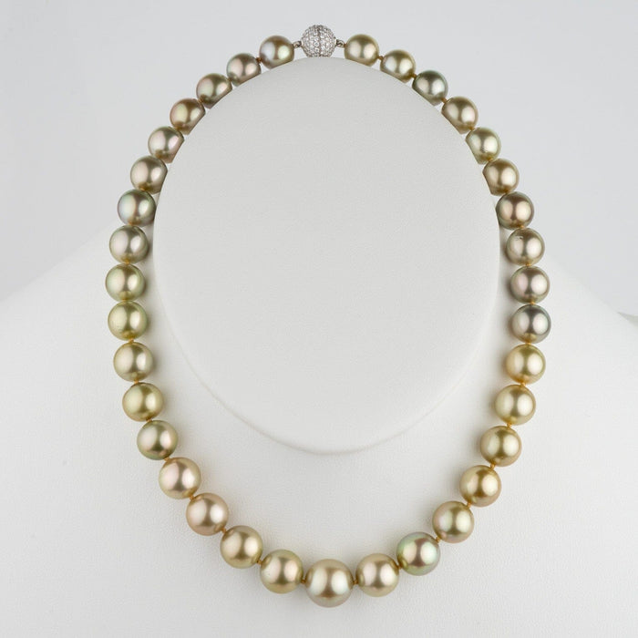 Assael Collection: 10.0–12.9 mm Fijian Pearl Necklace featuring large, lustrous cultured pearls in shades of gold and green with a decorative clasp on a white display bust.