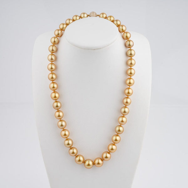 9.2–11.4 mm deep golden South Sea pearl and diamond necklace on bust
