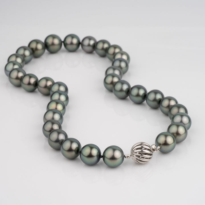AAA Tahitian Pearl Necklace 11.1–13.9 mm Natural Color laid out

