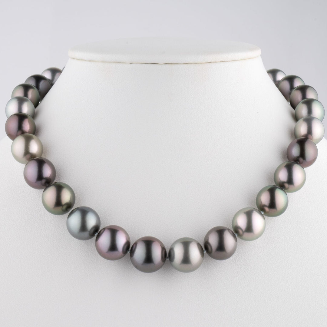 One-of-a-kind multicolor Tahitian pearl necklace, 29 round pearls 13.0–15.5 mm, 28.9 momme. Rare natural colors, 18k WG clasp with 2.30 ct diamonds.