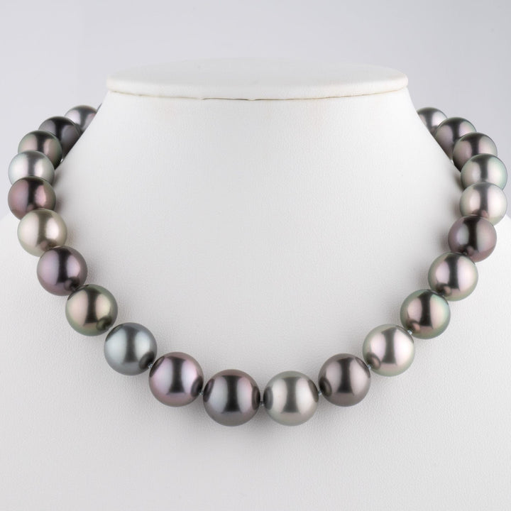 One-of-a-kind multicolor Tahitian pearl necklace, 29 round pearls 13.0–15.5 mm, 28.9 momme. Rare natural colors, 18k WG clasp with 2.30 ct diamonds.
