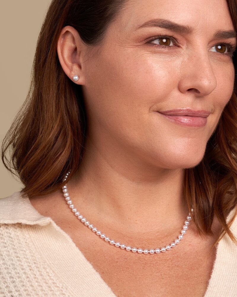5.5-6.0 mm White Freshadama Freshwater Pearl Stud Earrings on model