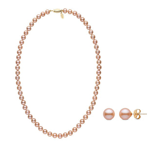 A set of pink Freshadama pearls with a necklace and matching earrings, both knotted and mounted on gold posts respectively.