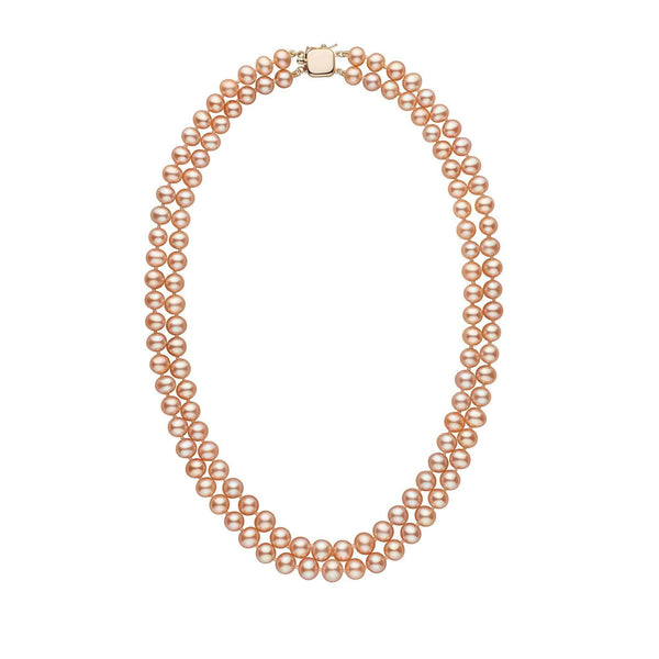 A double strand pink pearl necklace with a solid 14 karat gold clasp and safety catch.
