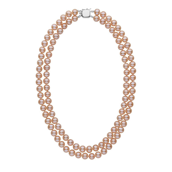 A double strand of round pink to peach freshwater pearls with a white gold clasp.