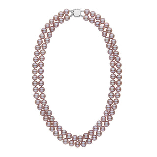 A double strand of lavender freshwater pearls with a clasp, knotted and displayed against a white background.