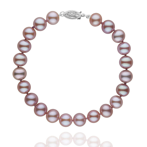 7.5-8.0 mm Lavender Freshwater AA+ Pearl Bracelet featuring round, lustrous lavender pearls strung together with a decorative 14K white gold clasp, perfect for elegant occasions.