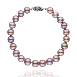 7.5-8.0 mm AAA Lavender Freshwater Pearl Bracelet featuring round, lustrous lavender freshwater pearls with a decorative 14K white gold clasp, perfect for elegant wear.