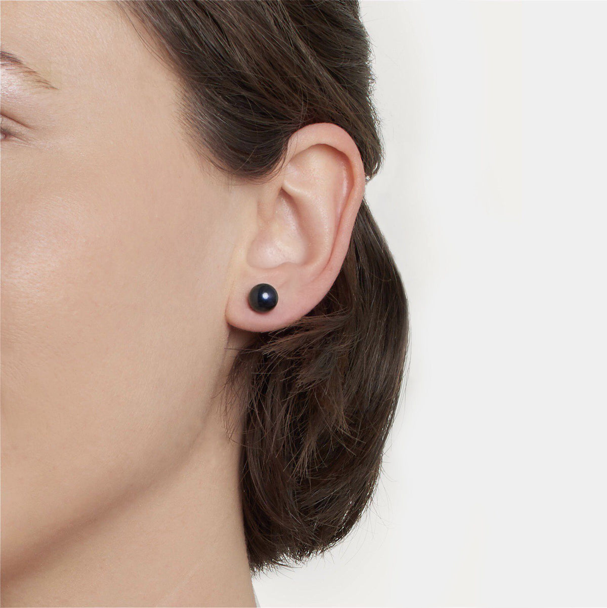 7.5-8.0 mm AA+ Black Akoya Pearl Stud Earrings on model