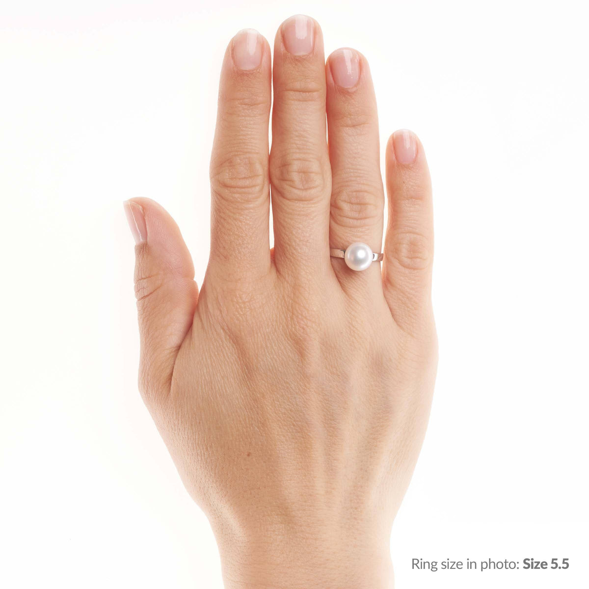 Hand wearing Classic Collection 8.5-9.0 mm Freshadama Pearl Ring with a single white freshwater pearl set on a delicate 14K white gold band.
