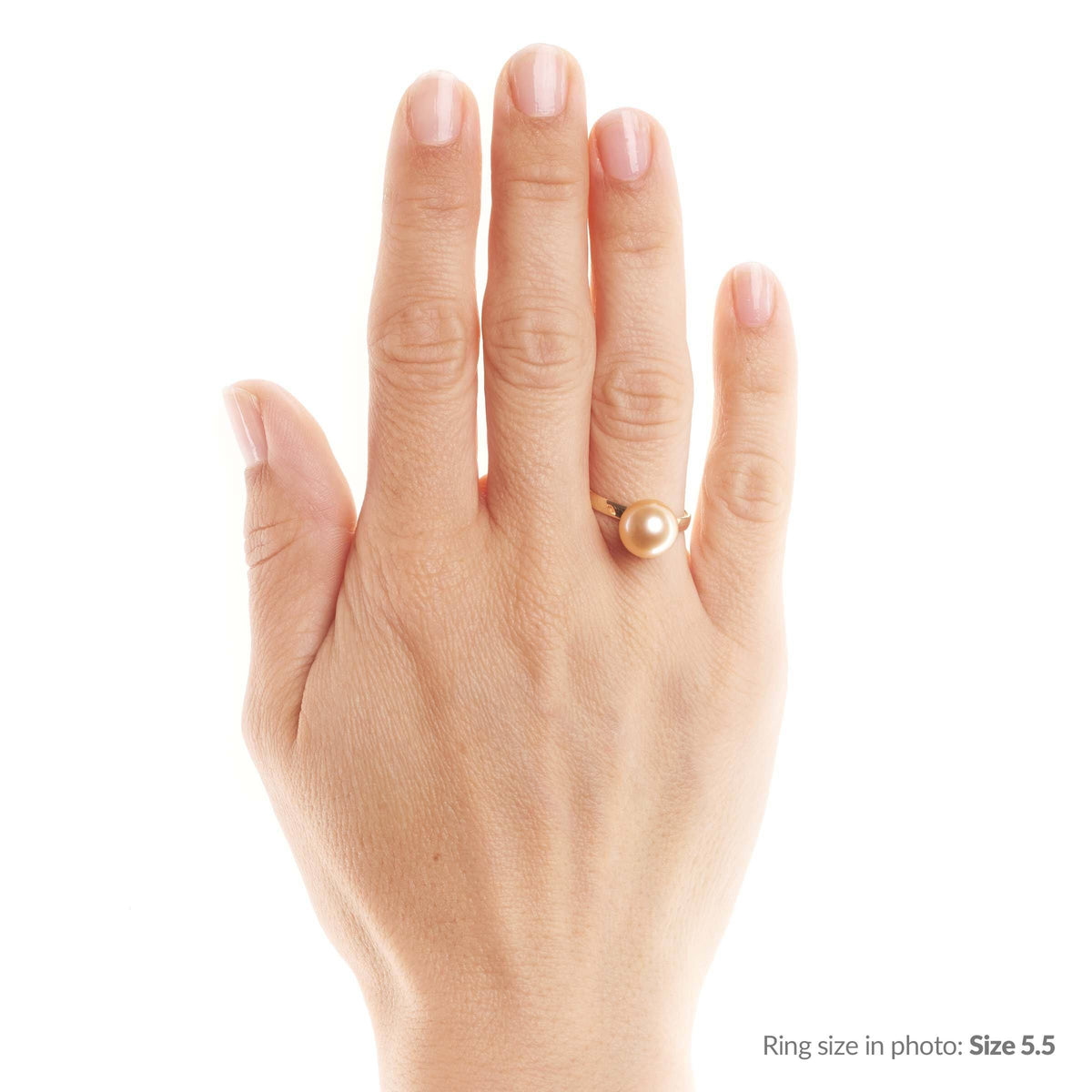 AAA 9.0–10.0 mm Golden South Sea pearl ring set in a 2.5 mm 14K band on model