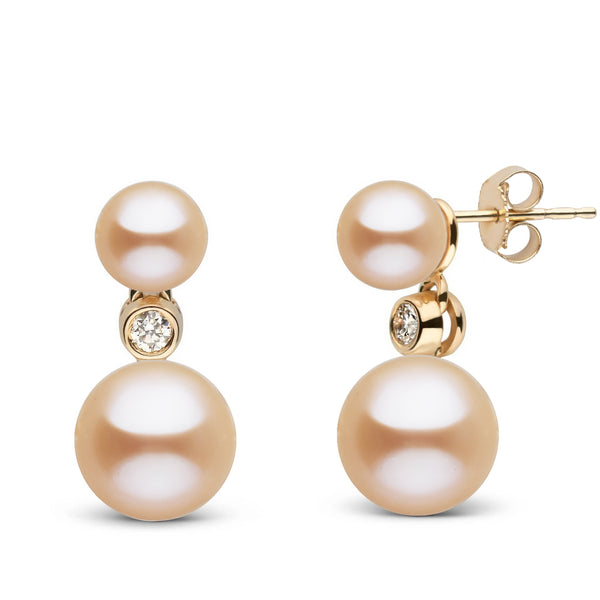 6.5-9.0 mm Pink Freshadama Pearl and Diamond Duet Dangle Earrings featuring two pink freshwater pearls connected by a small diamond set in gold, elegant and refined design.