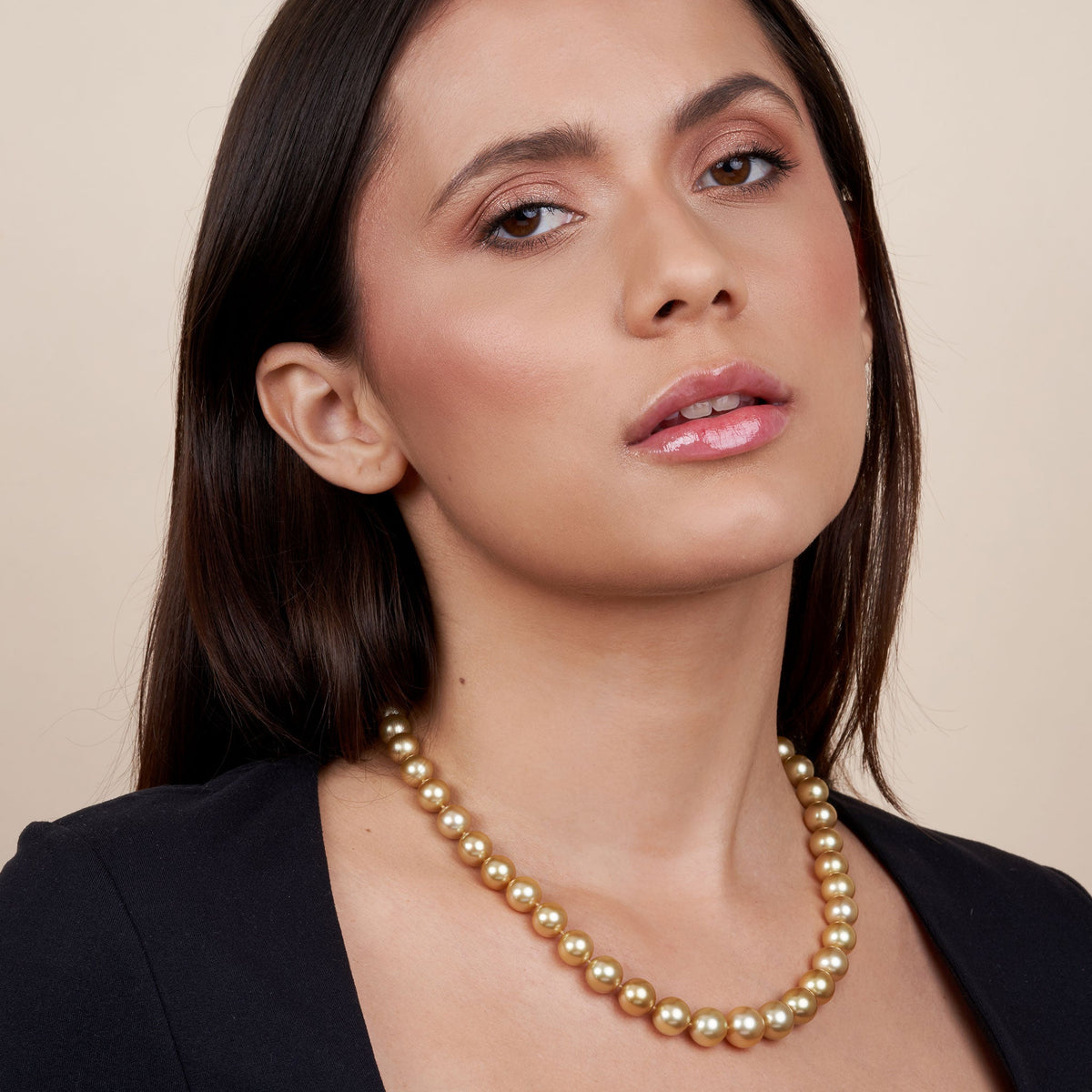 8.4-11.6 mm AA+/AAA Round Golden South Sea Pearl Necklace on model