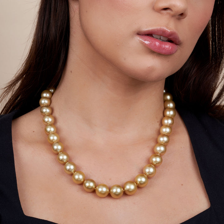 11.1-14.2 mm AA+/AAA Golden South Sea Round Pearl Necklace model closeup