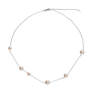 Luna Collection White Freshadama Pearl Necklace featuring delicate freshwater pearls spaced along a fine white metal chain for an elegant and minimalist look.