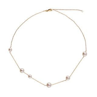Luna Collection White Freshadama Pearl Necklace featuring delicate freshwater white pearls arranged on a fine gold chain, perfect for elegant and timeless style.