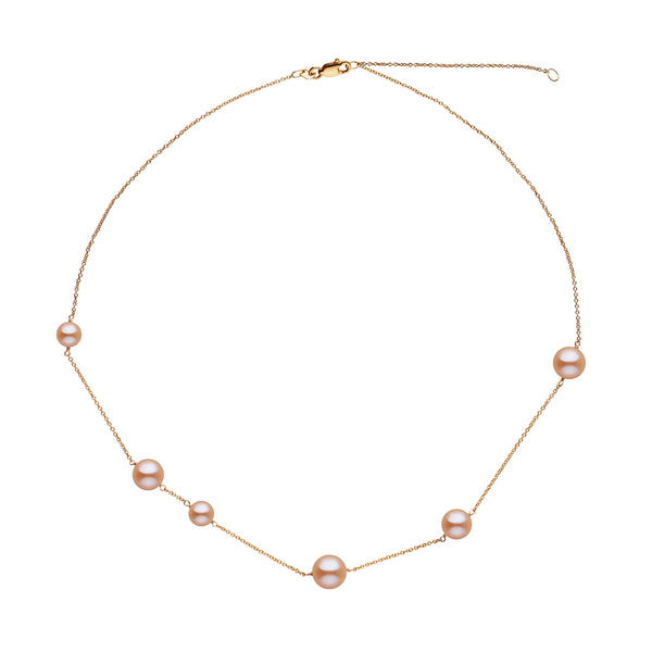 Luna Collection Pink Freshadama Pearl Necklace featuring six pink freshwater pearls spaced evenly on a delicate yellow gold chain.