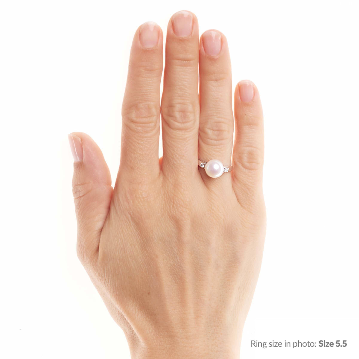 Hand wearing a Promise Collection 8.5-9.0 mm Freshadama Pearl Ring featuring a single lustrous freshwater pearl set in a 14K white gold band with accent stones.