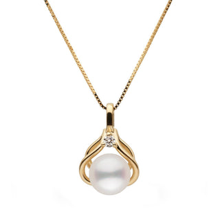 Tiara Collection 6.5-7.0 mm White Freshadama Pearl and Diamond Pendant featuring a white pearl set in a delicate gold setting with a small diamond accent on a gold chain.