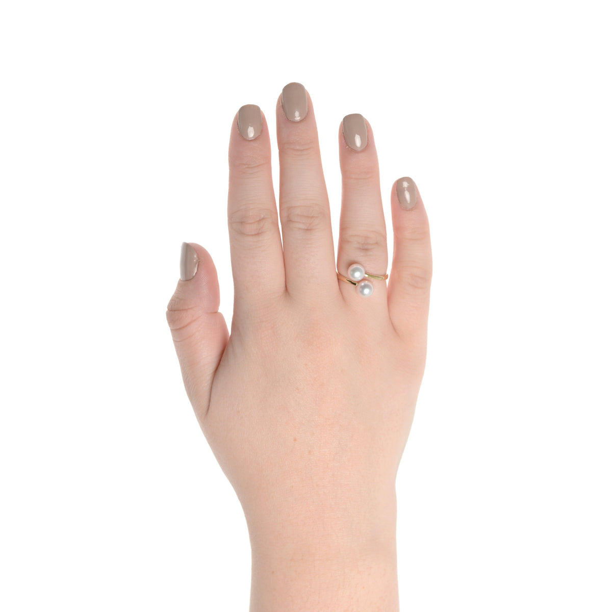 Hand wearing a Bypass Collection 6.5-7.0 mm Freshadama Pearl Ring featuring two freshwater pearls in a delicate open gold band design.