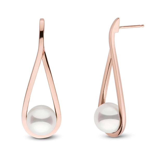 A perfect pair of akoya pearls set in our cradle collection earring style