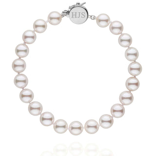 Personalized 7.5-8.0 mm AAA Akoya Pearl Circle Clasp Bracelet featuring lustrous white akoya pearls and a polished circular clasp engraved with initials.
