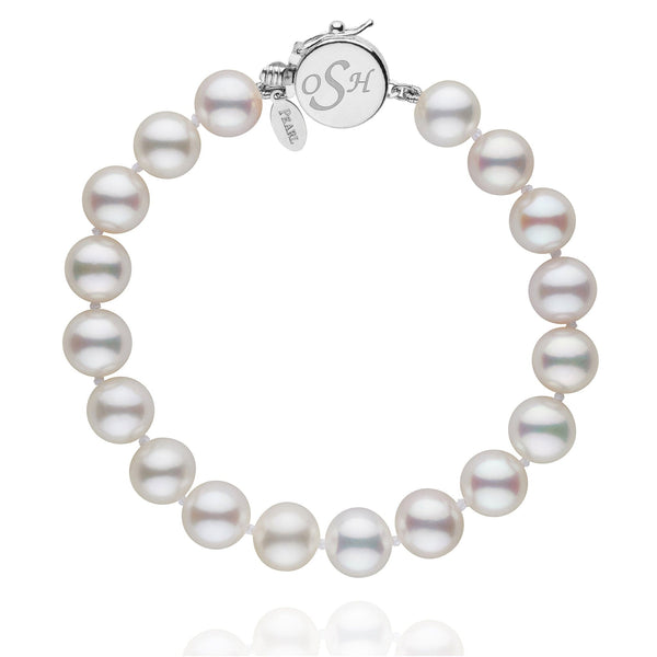 Personalized 8.5-9.0 mm White Freshadama Freshwater Pearl Circle Clasp Bracelet featuring lustrous white pearls with a polished 14K white gold circle clasp engraved with initials.