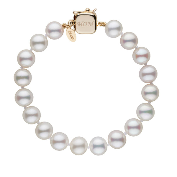 Personalized 8.5-9.0 mm White Freshadama Freshwater Pearl Square Clasp Bracelet featuring a gold square clasp engraved with “MOM” and lustrous white freshwater pearls.