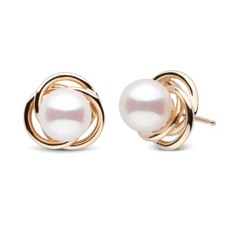 Trilogy Collection 7.0-7.5 mm White Akoya Pearl Earrings featuring lustrous white pearls set in elegant yellow gold swirl stud settings.