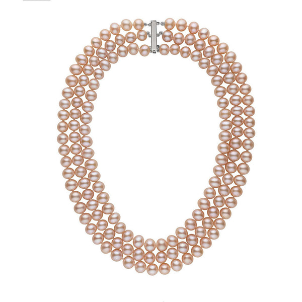A triple strand of pink to peach freshwater pearl necklace with a solid 14 karat gold clasp.